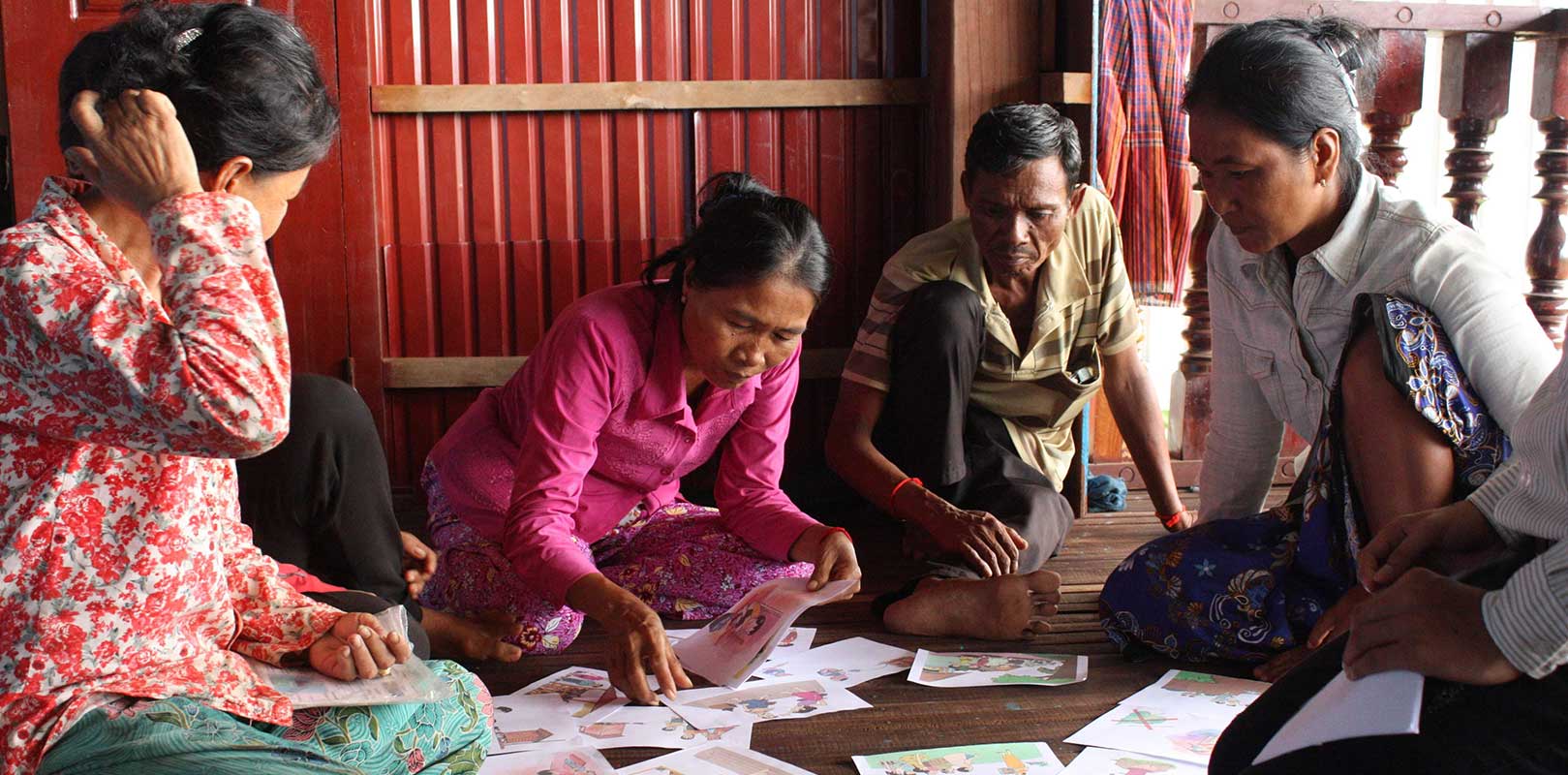 volunteers and beneficiaries of the Phnom Sanitation project discussing about the project