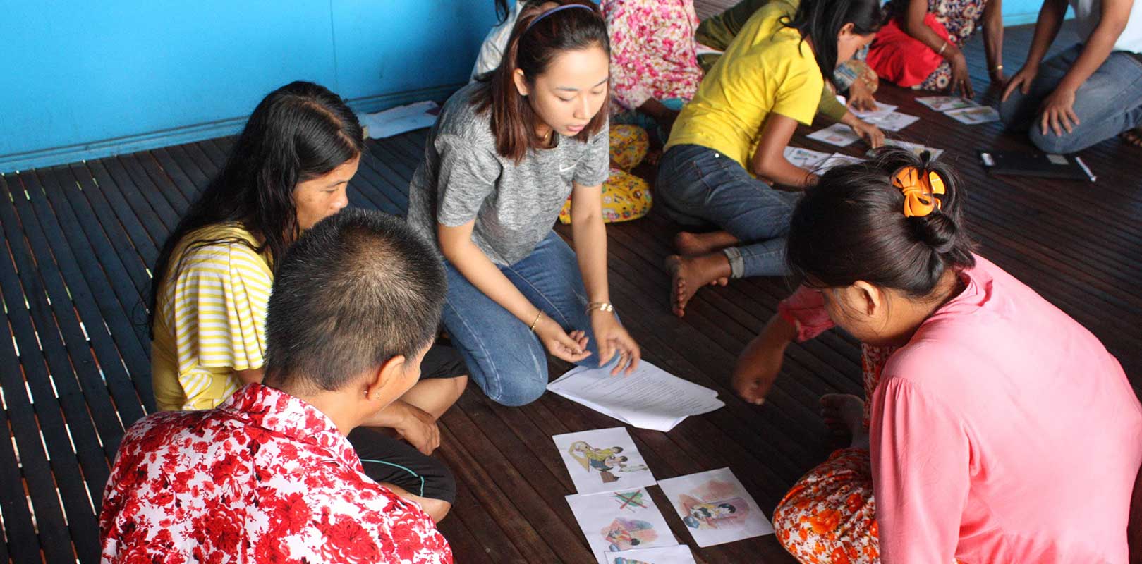 volunteers and beneficiaries of the Phnom Sanitation project discussing about the project